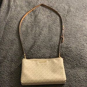 Beige and light brown Michael Kors Crossbody bag.